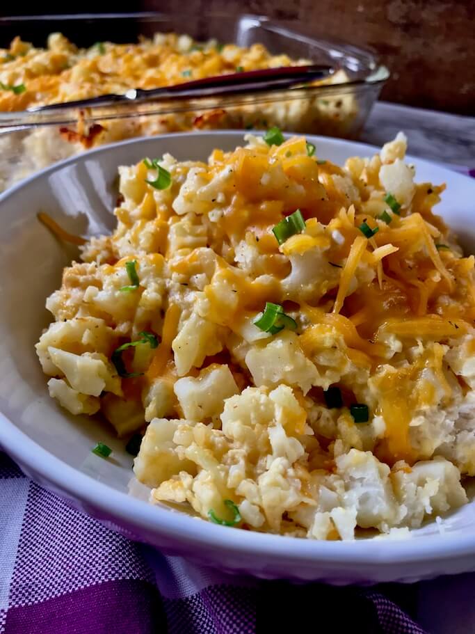 Closeup view of a bowl of freshly-cooked Skinny Cheesy Potatoes.

Thank you so much for viewing this recipe! We hope you enjoy these Skinny Cheesy Potatoes as much as we did, and we'd love it if you try more of our recipes. Have a great day!