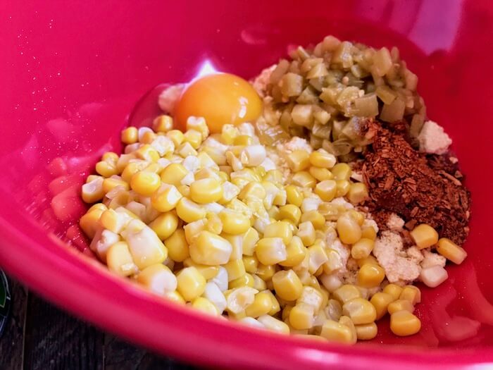 Chicken Tamale Bake mixing bowl with ingredients ready to be mixed