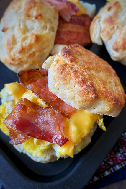 scrambled eggs and bacon and biscuits