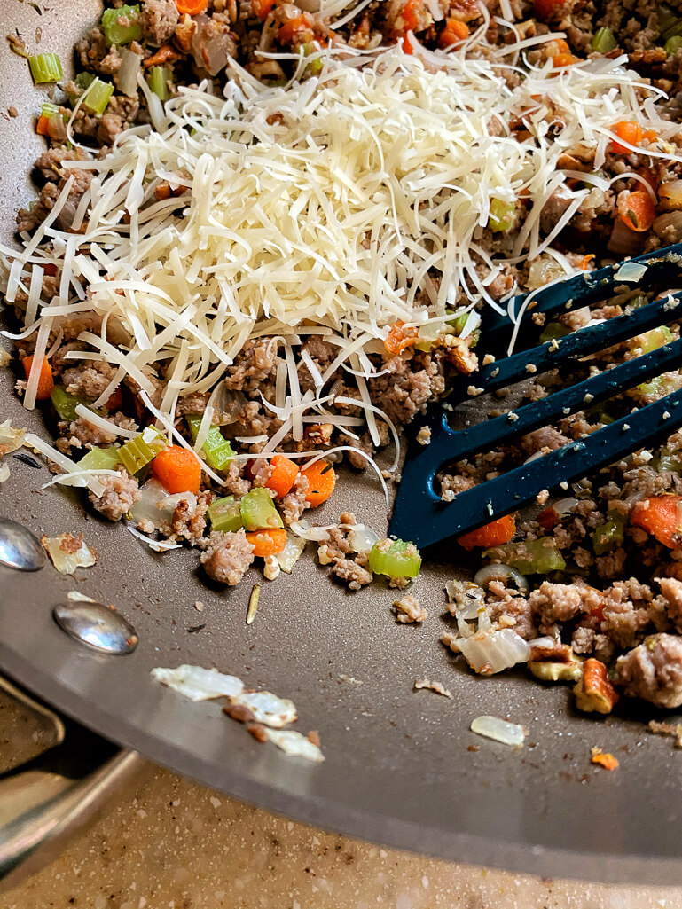 sausage and vegetable mix with parmesan cheese 