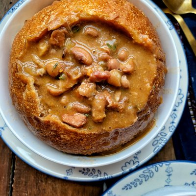 ham and bean soup in a bread bowl