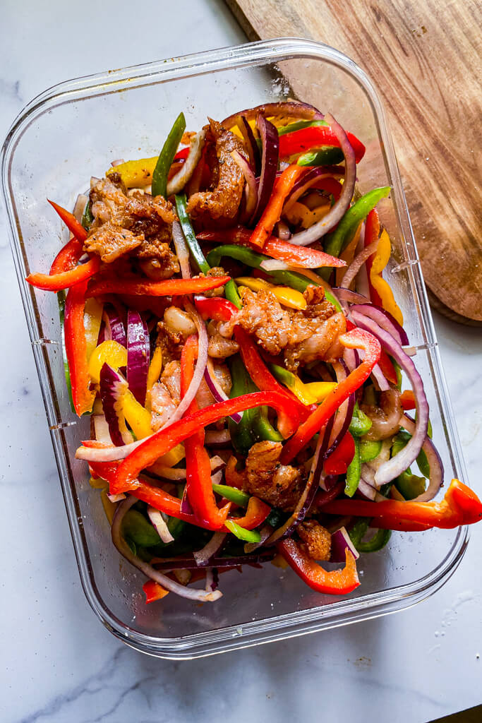 sliced peppers and chicken together 