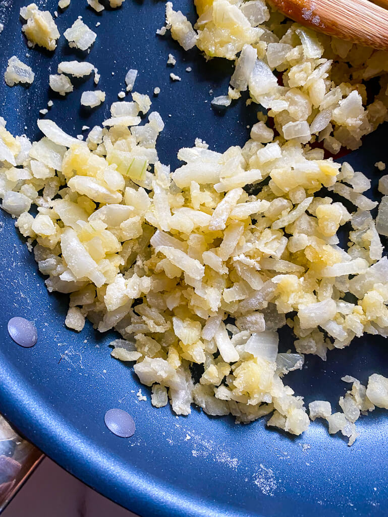 floured  onions in blue pan