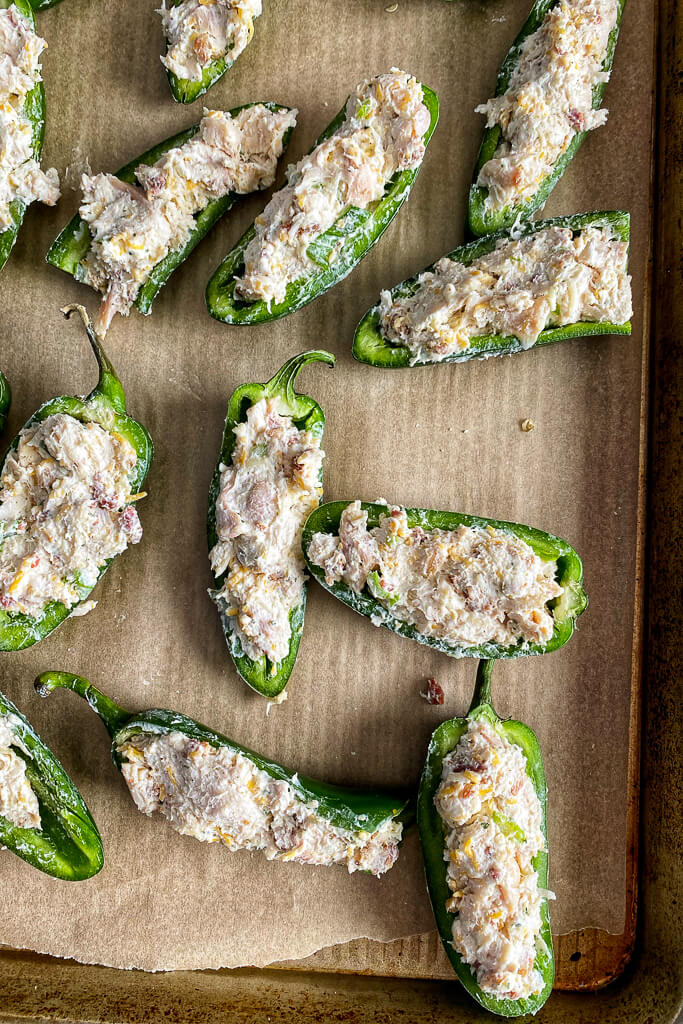 cream cheese and chicken mixture stuffed into jalapeños 