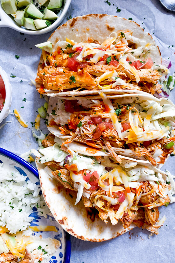 instant pot buffalo chicken tacos with toppings 