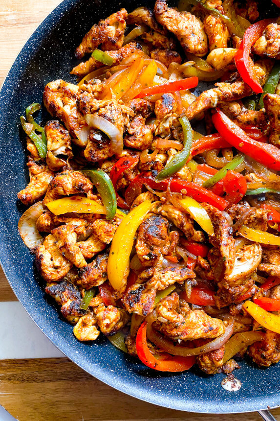 cooked chicken fajitas in a pan 