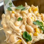 big scoop of white chicken chili