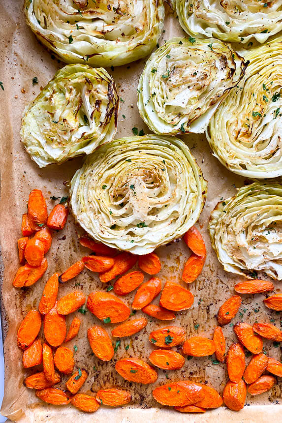 carrots and cabbage on sheet pan