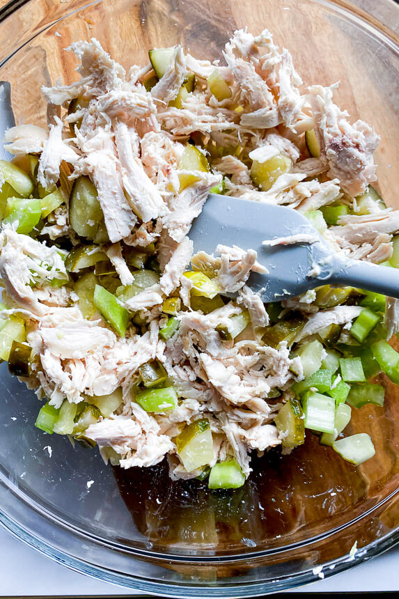 bowl with chicken, celery, and pickles