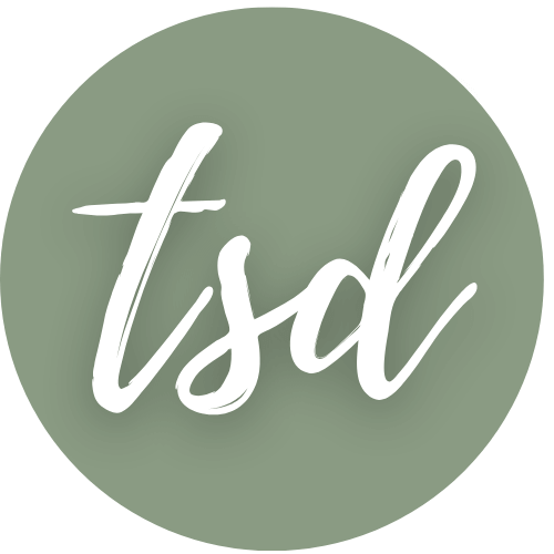 sage circle with cursive tsd inside