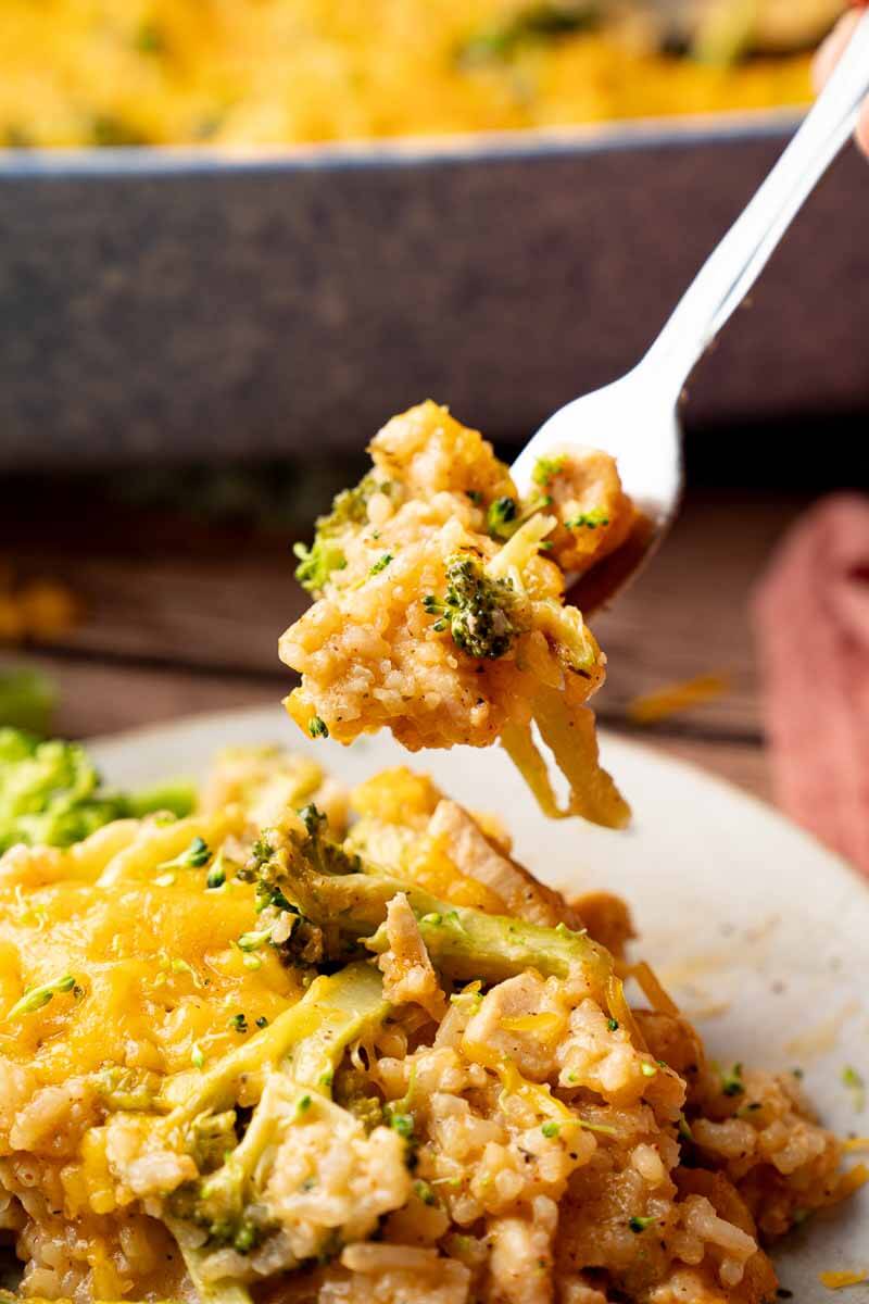 a fork full of chicken broccoli rice casserole