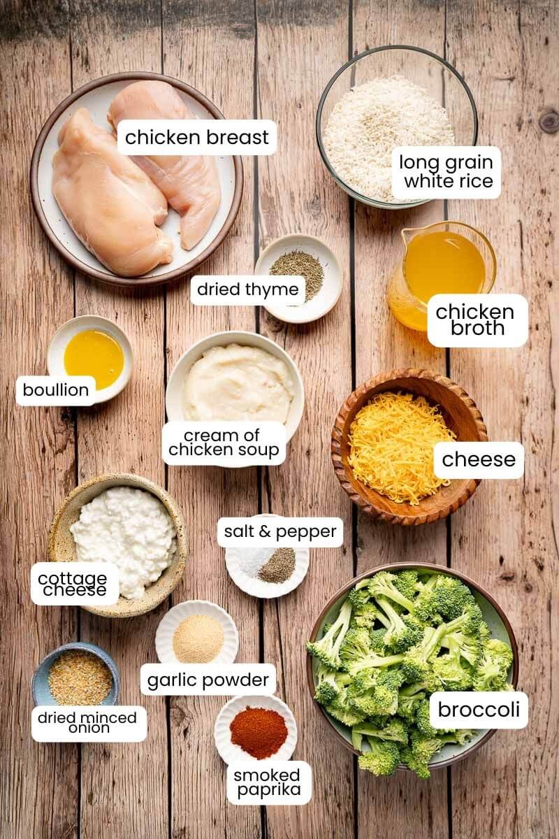 ingredients for a chicken and rice casserole including broccoli, chicken breast, rice, cheese, and seasonings