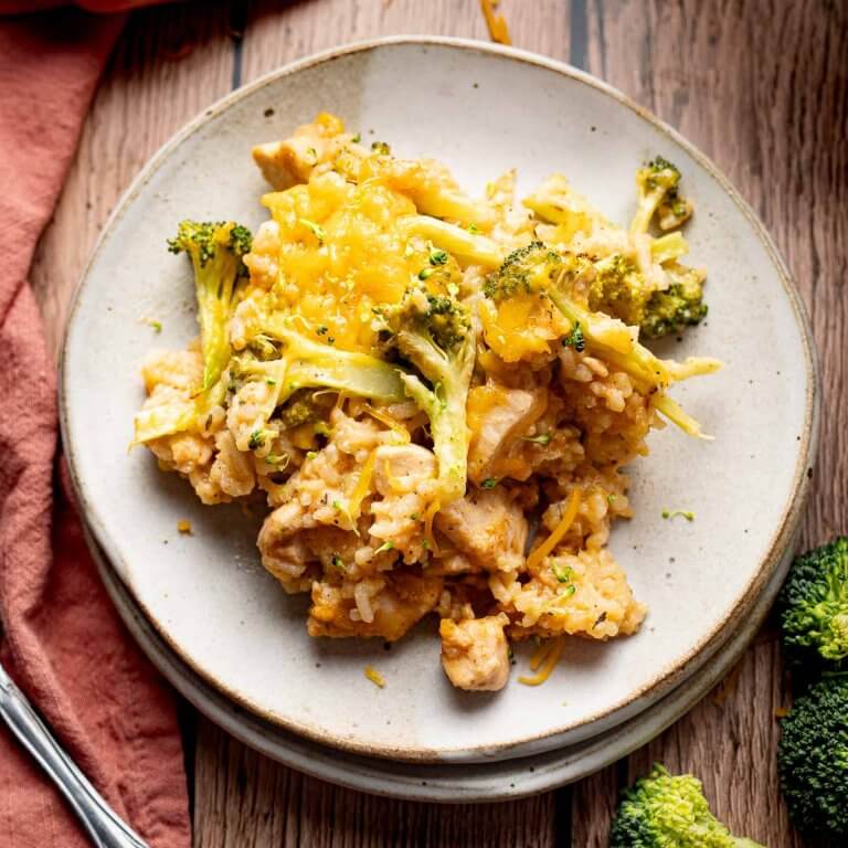 chicken broccoli rice casserole with cheesy chicken, rice, and broccoli on a plate