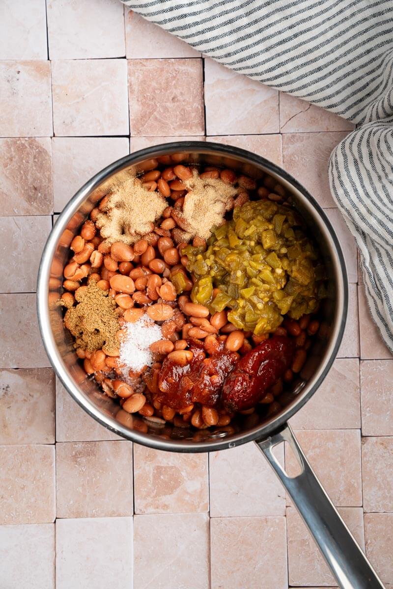 saucepan with pinto beans and spices before cooking