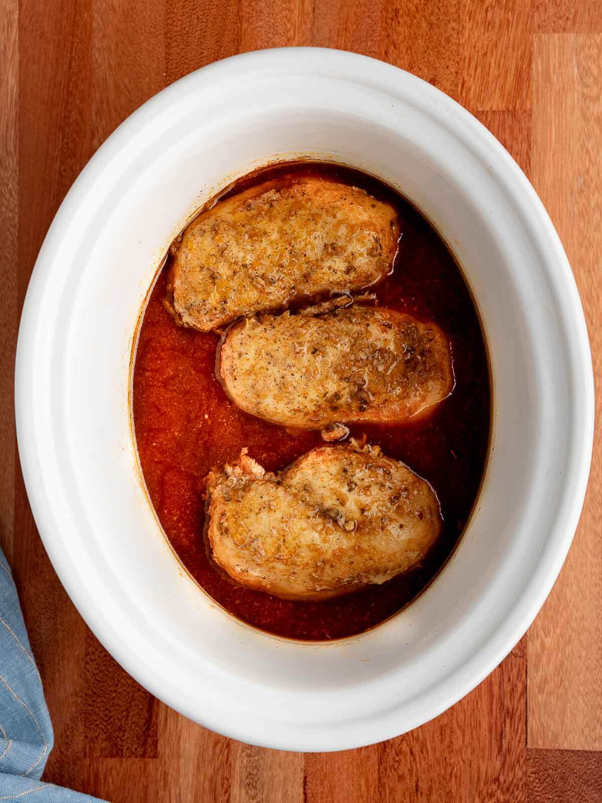 cooked chicken breast in crockpot.