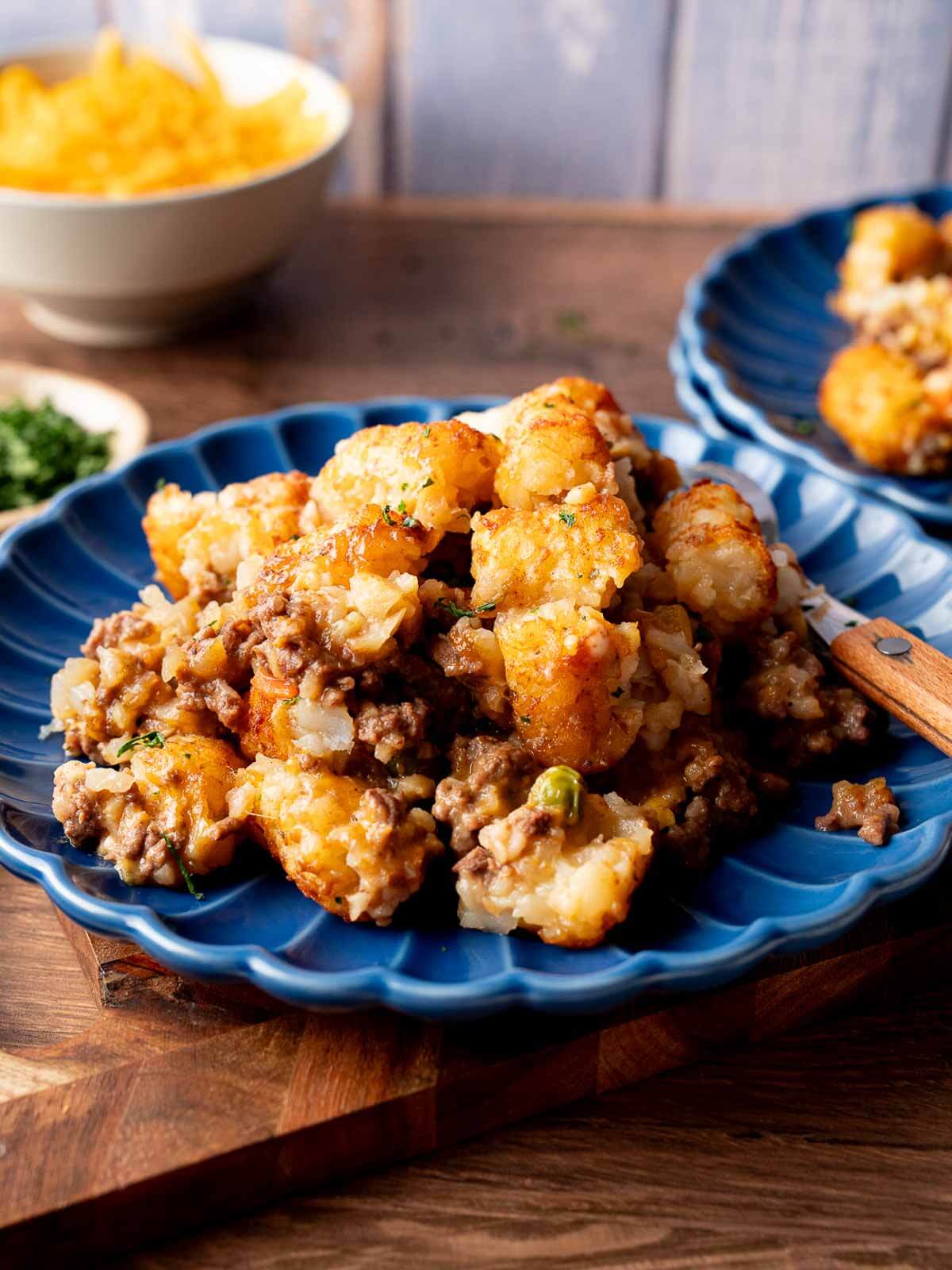 plate full of tater tot casserole.